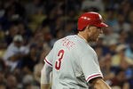 LOS ANGELES, CA - AUGUST 08:  Shane Victorino #8 of the Philadelphia Phillies celebrates his run with Hunter Pence for a 4-1 lead over the Los Angeles Dodgers during the seventh inning at Dodger Stadium on August 8, 2011 in Los Angeles, California.  (Photo by Harry How/Getty Images)