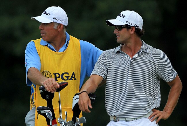 JOHNS CREEK, GA - AUGUST 13:  Adam Scott of Australia (R) and caddie Steve Williams (L) look on from the ninth tee during the third round of the 93rd PGA Championship at the Atlanta Athletic Club on August 13, 2011 in Johns Creek, Georgia.  (Photo by David Cannon/Getty Images)