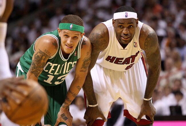 MIAMI, FL - MAY 03:  LeBron James #6 of the Miami Heat talks with Delonte West #13 of  the Boston Celtics during Game Two of the Eastern Conference Semifinals of the 2011 NBA Playoffs at American Airlines Arena on May 3, 2011 in Miami, Florida. NOTE TO USER: User expressly acknowledges and agrees that, by downloading and/or using this Photograph, User is consenting to the terms and conditions of the Getty Images License Agreement.  (Photo by Mike Ehrmann/Getty Images)