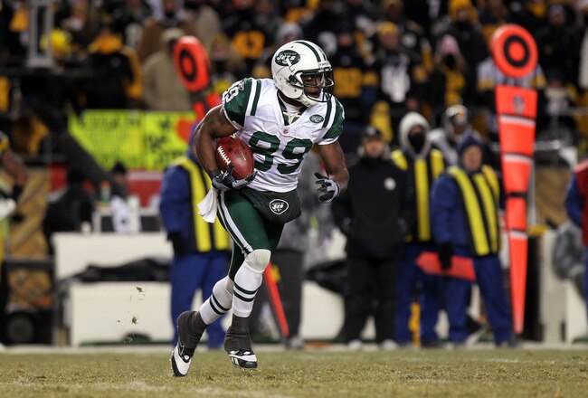 PITTSBURGH, PA - JANUARY 23:  Jerricho Cotchery #89 of the New York Jets returns a punt against the Pittsburgh Steelers during the 2011 AFC Championship game at Heinz Field on January 23, 2011 in Pittsburgh, Pennsylvania. The Steelers won 24-19.  (Photo by Nick Laham/Getty Images)