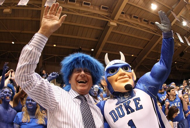 DURHAM, NC - MARCH 06:  ESPN analyst Dick Vitale celebrates with the Cameron Crazies before the start of the game between the North Carolina Tar Heels and Duke Blue Devils at Cameron Indoor Stadium on March 6, 2010 in Durham, North Carolina.  (Photo by Streeter Lecka/Getty Images)