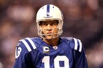 INDIANAPOLIS, IN - JANUARY 08:  Quarterback Peyton Manning #18 of the Indianapolis Colts looks on during warm ups against the New York Jets during their 2011 AFC wild card playoff game at Lucas Oil Stadium on January 8, 2011 in Indianapolis, Indiana.  (Photo by Andy Lyons/Getty Images)