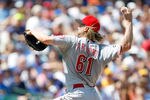CHICAGO, IL - AUGUST 07: Bronson Arroyo #61 of the Cincinnati Reds pitches against the Chicago Cubs at Wrigley Field on August 7, 2011 in Chicago, Illinois. (Photo by Scott Boehm/Getty Images)