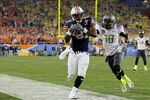 GLENDALE, AZ - JANUARY 10:  Terrell Zachery #81 of the Auburn Tigers runs out of bounds in front of Anthony Gildon #18 of the Oregon Ducks during the Tostitos BCS National Championship Game at University of Phoenix Stadium on January 10, 2011 in Glendale, Arizona.  (Photo by Kevin C. Cox/Getty Images)