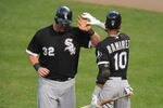 BALTIMORE, MD - AUGUST 11:  Adam Dunn #32 of the Chicago White Sox celebrates scoring a run with Alexei Ramirez #10 during the third inning of a baseball game against the Baltimore Orioles at Oriole Park at Camden Yards on August 11, 2011 in Baltimore, Maryland.  The White SOx won 6-3.  (Photo by Mitchell Layton/Getty Images)