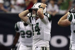 HOUSTON - AUGUST 15:  Quarterback Greg McElroy #14 of the New York Jets grabs his head after wide receiver Michael Campbell #84 dropped a wide open pass in the endzone in the fourth quarter against the Houston Texans at Reliant Stadium on August 15, 2011 in Houston, Texas.  (Photo by Bob Levey/Getty Images)