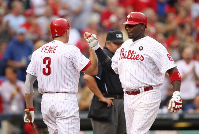 PHILADELPHIA - AUGUST 13: First baseman Ryan Howard #6 of the Philadelphia Phillies is congratulated after his home run by right fielder Hunter Pence #3 during a game against the Washington Nationals at Citizens Bank Park on August 13, 2011 in Philadelphia, Pennsylvania. (Photo by Hunter Martin/Getty Images)