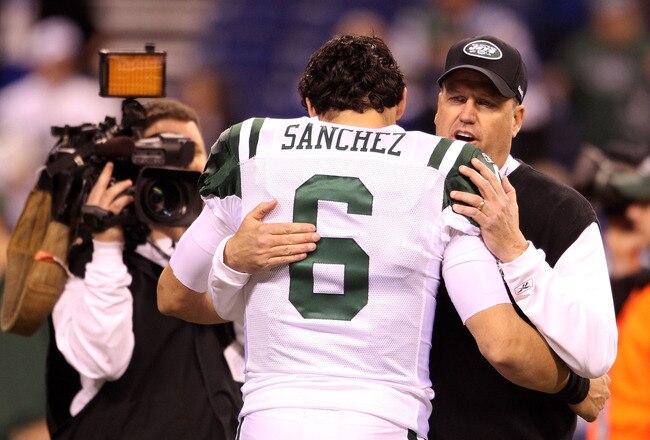 INDIANAPOLIS, IN - JANUARY 08:  Head coach Rex Ryan and Mark Sanchez #6 of the New York Jets talk on the field during warm ups against the Indianapolis Colts during their 2011 AFC wild card playoff game at Lucas Oil Stadium on January 8, 2011 in Indianapolis, Indiana.  (Photo by Andy Lyons/Getty Images)