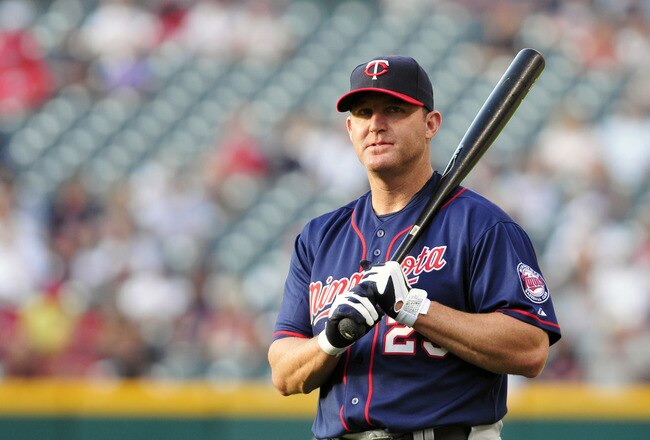 CLEVELAND, OH - AUGUST 12: Designated hitter Jim Thome #25 of the Minnesota Twins warms up prior to the game against the Cleveland Indians at Progressive Field on August 12, 2011 in Cleveland, Ohio. (Photo by Jason Miller/Getty Images)