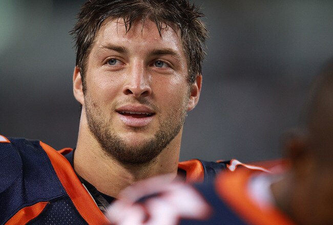 ARLINGTON, TX - AUGUST 11:  Tim Tebow #15 of the Denver Broncos at Cowboys Stadium on August 11, 2011 in Arlington, Texas.  (Photo by Ronald Martinez/Getty Images)