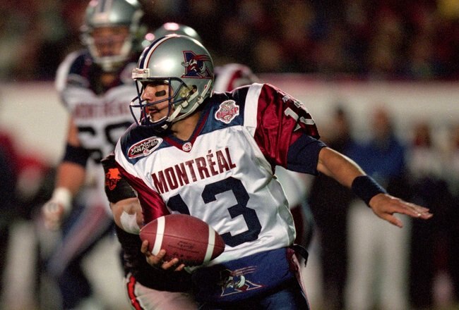 26 Nov 2000:  Anthony Calvillo #13 of the Montreal Alouettes runs with the ball during the Grey Cup 2000 game against the British Columbia Lions at the McMahon Stadium in Calgary, Alberta, Canada. The Lions defeated the Alouettes 28-26.Mandatory Credit: Craig Klem /Allsport