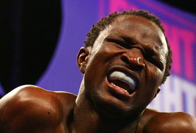 NEWARK, NJ - DECEMBER 11:  Joseph Agbeko is in pain after being hit by a low blow by William Gonzalez during their IBF Bantamweight Championship fight on December 11, 2008 at The Prudential Center in Newark, New Jersey.  (Photo by Al Bello/Getty Images)