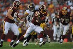 LANDOVER, MD - AUGUST 12:  Tim Hightower #39 of the Washington Redskins runs the ball against the Pittsburgh Steelers  at FedExField on August 12, 2011 in Landover, Maryland. The Redskins defeated the Steelers 16-7. (Photo by Larry French/Getty Images)