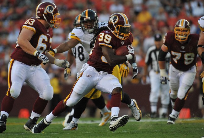 LANDOVER, MD - AUGUST 12:  Tim Hightower #39 of the Washington Redskins runs the ball against the Pittsburgh Steelers  at FedExField on August 12, 2011 in Landover, Maryland. The Redskins defeated the Steelers 16-7. (Photo by Larry French/Getty Images)