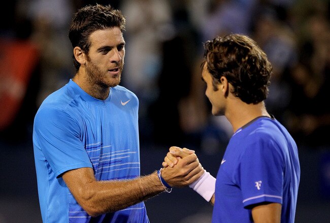 MASON, OH - AUGUST 16: Juan Martin Del Potro of Argentina (L) congratulates Roger Federer of Switzerland after their match during the Western & Southern Open at the  Lindner Family Tennis Center on August 16, 2011 in Mason, Ohio.  (Photo by Matthew Stockman/Getty Images)