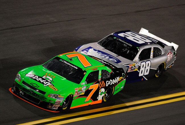 DAYTONA BEACH, FL - JULY 01: (L-R) Danica Patrick, driver of the #7 GoDaddy.com Chevrolet and Aric Almirola, driver of the #88 Suave Men Chevrolet, race and bump draft during the NASCAR Nationwide Series Subway Jalapeno 250 Powered by Coca-Cola at Daytona International Speedway on July 1, 2011 in Daytona Beach, Florida.  (Photo by John Harrelson/Getty Images for NASCAR)