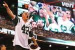 EAST RUTHERFORD, NJ - SEPTEMBER 19:  New York Jets fan Fireman Ed Anzalone leads the crowd in a cheer against the New England Patriots during their  game on September 19, 2010 at the New Meadowlands Stadium  in East Rutherford, New Jersey.  (Photo by Al Bello/Getty Images)