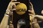 OMAHA, NE - JUNE 28:  The South Carolina Gamecocks celebrate with the trophy after winning the men's 2011 NCAA College Baseball World Series at TD Ameritrade Park Omaha on June 28, 2011 in Omaha, Nebraska.  The Gamecocks defeated the Florida Gators 5-2 and won the series 2-0.  (Photo by Ronald Martinez/Getty Images)