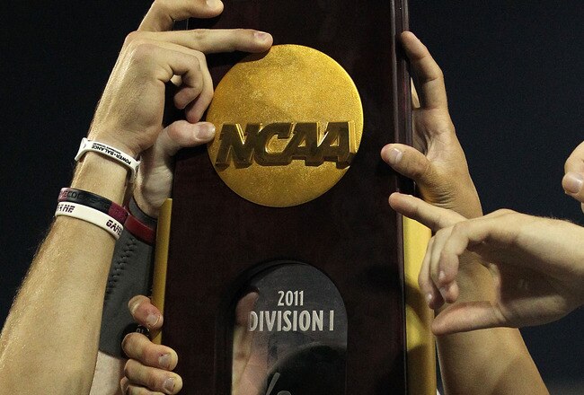 OMAHA, NE - JUNE 28:  The South Carolina Gamecocks celebrate with the trophy after winning the men's 2011 NCAA College Baseball World Series at TD Ameritrade Park Omaha on June 28, 2011 in Omaha, Nebraska.  The Gamecocks defeated the Florida Gators 5-2 and won the series 2-0.  (Photo by Ronald Martinez/Getty Images)