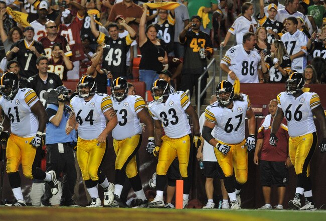 LANDOVER, MD - AUGUST 12:  The Pittsburgh Steelers celebrate a touchdown against the Washington Redskins at FedExField on August 12, 2011 in Landover, Maryland. The Redskins defeated the Steelers 16-7 at the half. (Photo by Larry French/Getty Images)