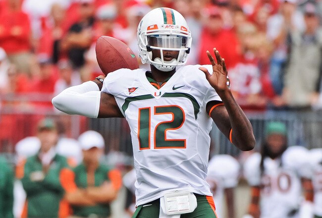 COLUMBUS, OH - SEPTEMBER 11:  Quarterback Jacory Harris #12 of the Miami Hurricanes passes the ball against the Ohio State Buckeyes at Ohio Stadium on September 11, 2010 in Columbus, Ohio.  (Photo by Jamie Sabau/Getty Images)