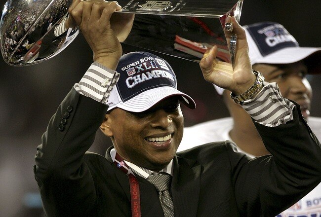 GLENDALE, AZ - FEBRUARY 03:  General Manager Jerry Reese of the New York Giants holds the Vince Lombardi Trophy after defeating the New England Patriots 17-14 in Super Bowl XLII on February 3, 2008 at the University of Phoenix Stadium in Glendale, Arizona.  (Photo by Donald Miralle/Getty Images)
