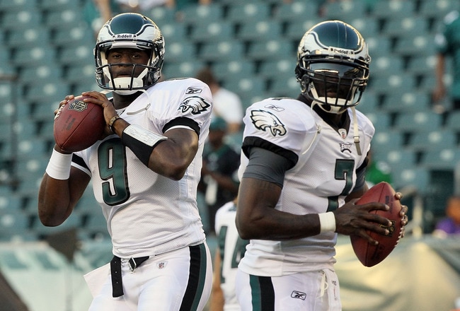 PHILADELPHIA, PA - AUGUST 11:  Vince Young #9 and Michael Vick #7 of the Philadelphia Eagles warm up before playing against the Baltimore Ravens during their pre season game on August 11, 2011 at Lincoln Financial Field in Philadelphia, Pennsylvania.  (Photo by Jim McIsaac/Getty Images)