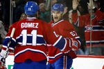 MONTREAL, CANADA - JANUARY 22:  Max Pacioretty #67 of the Montreal Canadiens celebrates his second period goal with teammate Scott Gomez #11 during the NHL game against the Anaheim Ducks at the Bell Centre on January 22, 2011 in Montreal, Quebec, Canada.  (Photo by Richard Wolowicz/Getty Images)