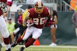 PHILADELPHIA - OCTOBER 03:  Clinton Portis #26 of the Washington Redskins runs the ball against the Philadelphia Eagles on October 3, 2010 at Lincoln Financial Field in Philadelphia, Pennsylvania.  (Photo by Jim McIsaac/Getty Images)