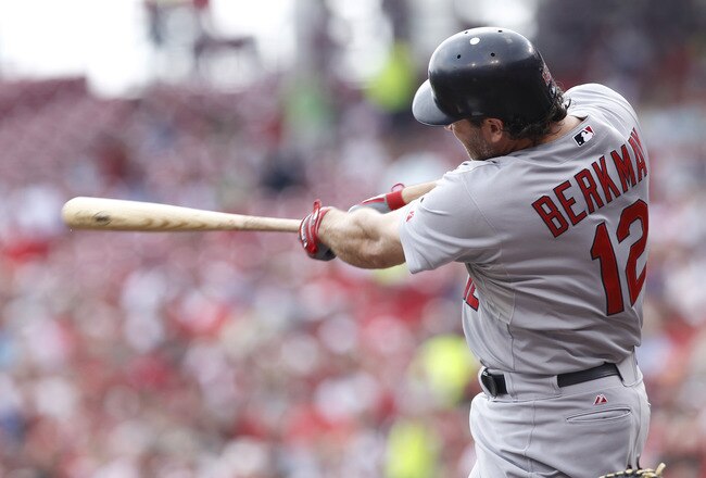 CINCINNATI, OH - JULY 17: Lance Berkman #12 of the St. Louis Cardinals hits a home run in the second inning against the Cincinnati Reds at Great American Ball Park on July 17, 2011 in Cincinnati, Ohio. The Reds won 3-1. (Photo by Joe Robbins/Getty Images)