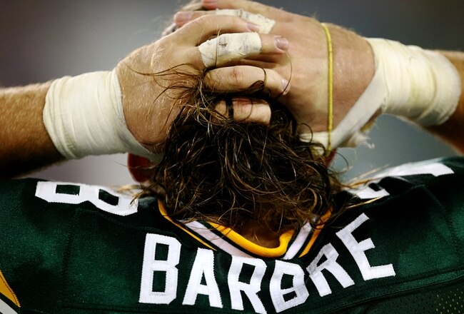 GREEN BAY, WI - AUGUST 15:  Offensive guard Allen Barbre #78 of the Green Bay Packers fixes his hair against the Cleveland Browns during the preseason game at Lambeau Field on August 15, 2009 in Green Bay, Wisconsin. (Photo by Jonathan Daniel/Getty Images)