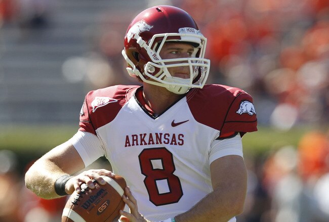 AUBURN, AL - OCTOBER 16:  Quarterback Tyler Wilson #8 of the Arkansas Razorbacks drops back and looks downfield before the game against the Auburn Tigers at Jordan-Hare Stadium on October 16, 2010 in Auburn, Alabama.  The Tigers beat the Razorbacks 65-43.  (Photo by Mike Zarrilli/Getty Images)