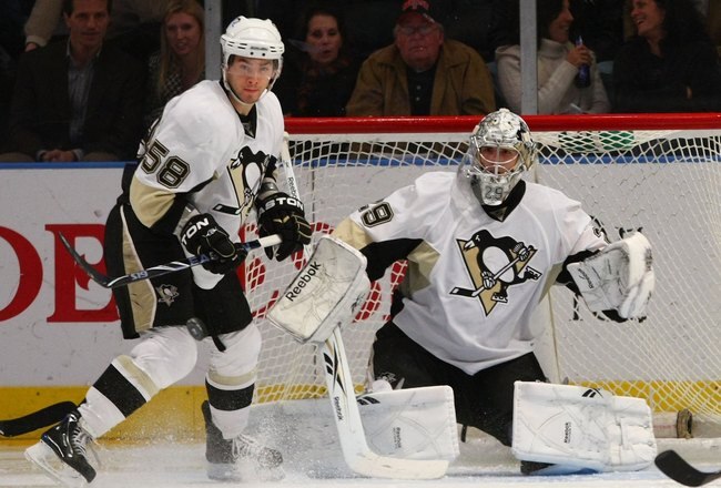 NEW YORK - NOVEMBER 30: Kris Letang #58 and goaltender Marc-Andre Fleury #29 of the Pittsburgh Penguins skate against the New York Rangers at Madison Square Garden on November 30, 2009 in New York, New York. (Photo by Bruce Bennett/Getty Images)