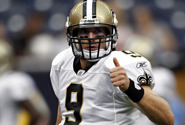 HOUSTON - AUGUST 20:  Quarterback Drew Brees #9 of the New Orleans Sainst looks to the bench during a pre-season football game against the Houston Texans at Reliant Stadium on August 20, 2011 in Houston, Texas.  (Photo by Bob Levey/Getty Images)