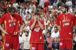 MADRID, SPAIN - SEPTEMBER 16:  Pau Gasol of Spain (R) stands dejected with his teammates Jose Calderon (C) and Marc Gasol after loosing the FIBA Eurobasket 2007 final match between Spain and Russia at the Palacio de Deportes Felipe II on September 16, 2007 in Madrid, Spain.  (Photo by Jasper Juinen/Getty Images)