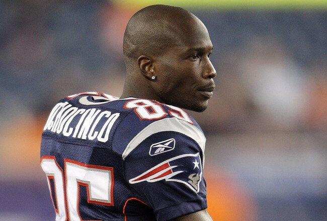 FOXBORO, MA - AUGUST 11:  Chad Ochocinco #85 of the New England Patriots watches the game from the sideline against the Jacksonville Jaguars on August 11, 2011 at Gillette Stadium in Foxboro, Massachusetts. The New England Patriots defeated the Jacksonville Jaguars 47-12.  (Photo by Elsa/Getty Images)
