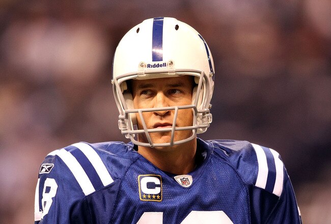 INDIANAPOLIS, IN - JANUARY 08:  Quarterback Peyton Manning #18 of the Indianapolis Colts looks on during warm ups against the New York Jets during their 2011 AFC wild card playoff game at Lucas Oil Stadium on January 8, 2011 in Indianapolis, Indiana.  (Photo by Andy Lyons/Getty Images)