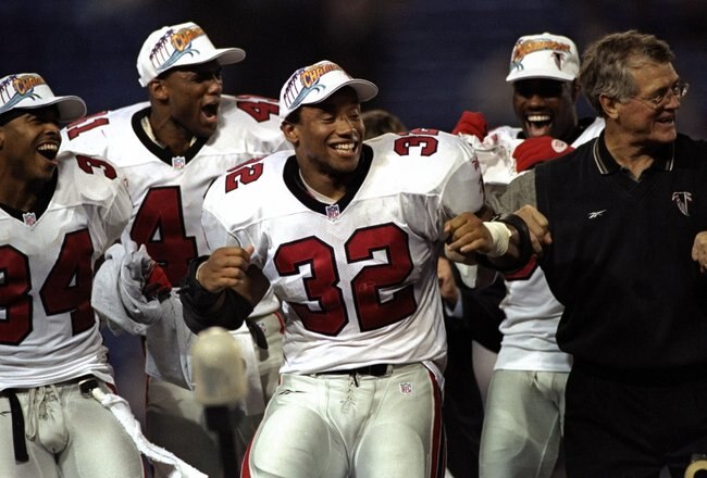 17 Jan 1999:  Jamal Anderson #32 of the Atlanta Falcons dances the dirty bird with coach Dan Reeves during the NFC Championship Game against the Minnesota Vikings at the H. H. H. Metrodome in Minneapolis, Minnesota. The Falcons defeated the Vikings 30-27. Mandatory Credit: Matthew Stockman  /Allsport