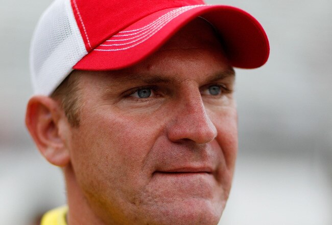 BRISTOL, TN - AUGUST 26:  Clint Bowyer, driver of the #33 Hamburger Helper Chevrolet, looks on during qualifying for the NASCAR Sprint Cup Series IRWIN Tools Night Race at Bristol Motor Speedway on August 26, 2011 in Bristol, Tennessee.  (Photo by Chris Graythen/Getty Images)