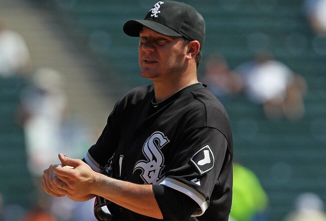 CHICAGO, IL - AUGUST 31: Jake Peavy #44 of the Chicago White Sox reacts after giving up a home run to the Minnesota Twins at U.S. Cellular Field on August 31, 2011 in Chicago, Illinois. The Twins defeated the White Sox 7-6. (Photo by Jonathan Daniel/Getty Images)