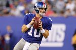 EAST RUTHERFORD, NJ - AUGUST 29:  Eli Manning #10 of the New York Giants in action against the New York Jets during their pre season game on August 29, 2011 at MetLife Stadium in East Rutherford, New Jersey.  (Photo by Jim McIsaac/Getty Images)