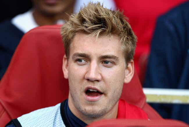 LONDON, ENGLAND - AUGUST 16:  Nicklas Bendtner of Arsenal looks on from the bench ahead of the UEFA Champions League play-off first leg match between Arsenal and Udinese at the Emirates Stadium on August 16, 2011 in London, England.  (Photo by Julian Finney/Getty Images)