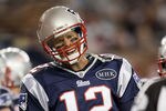 FOXBORO, MA - SEPTEMBER 01:   Tom Brady #12 of the New England Patriots reacts after the play is initially called short in the endzone against the New York Giants on September 1, 2011 at Gillette Stadium in Foxboro, Massachusetts.The play was later ruled a touchdown. (Photo by Elsa/Getty Images)
