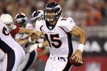 GLENDALE, AZ - SEPTEMBER 01:  Quarterback Tim Tebow #15 of the Denver Broncos scrambles with the football during the preseason NFL game against the Arizona Cardinals at the University of Phoenix Stadium on September 1, 2011 in Glendale, Arizona.  The Cardinals defeated the Broncos 26-7.  (Photo by Christian Petersen/Getty Images)