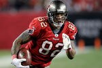 TAMPA, FL - DECEMBER 26:  Tight end Kellen Winslow #81 of the Tampa Bay Buccaneers runs after a catch against the Seattle Seahawks during the game at Raymond James Stadium on December 26, 2010 in Tampa, Florida.  (Photo by J. Meric/Getty Images)