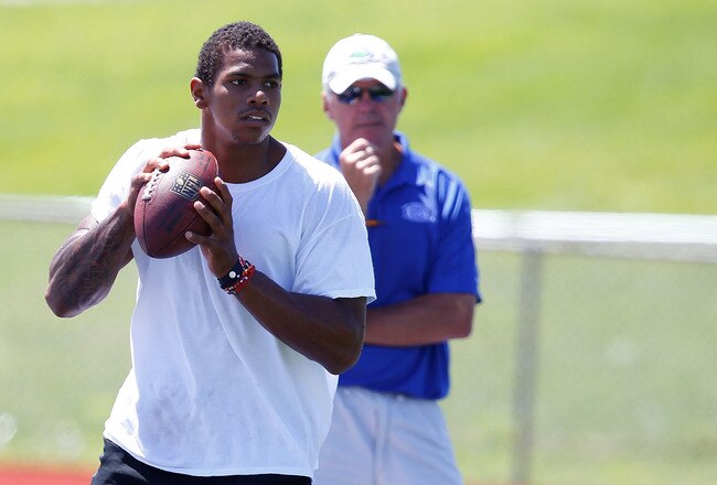 JEANNETTE, PA - AUGUST 12:  Terrelle Pryor works out at a practice facility while quarterbacks coach Ken Anderson looks on on August 12, 2011 in Jeannette, Pennsylvania.  (Photo by Jared Wickerham/Getty Images)