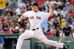 BOSTON, MA - SEPTEMBER 3:  Erik Bedard #23 of the Boston Red Sox throws a pitch in the first inning against the Texas Rangers at Fenway Park on September 3, 2011 in Boston, Massachusetts. (Photo by Darren McCollester/Getty Images)
