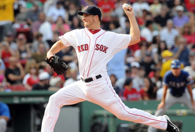 BOSTON, MA - SEPTEMBER 3:  Erik Bedard #23 of the Boston Red Sox throws a pitch in the first inning against the Texas Rangers at Fenway Park on September 3, 2011 in Boston, Massachusetts. (Photo by Darren McCollester/Getty Images)