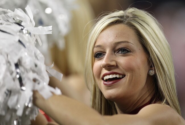 ARLINGTON, TX - DECEMBER 04:  A Oklahoma Sooners cheerleader during the Big 12 Championship at Cowboys Stadium on December 4, 2010 in Arlington, Texas.  (Photo by Ronald Martinez/Getty Images)
