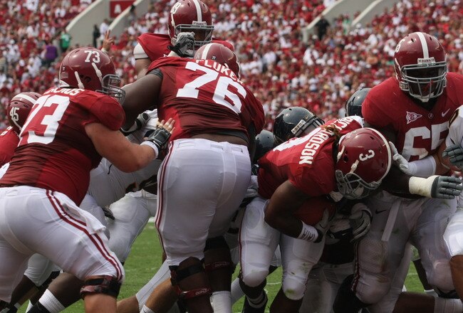 TUSCALOOSA, AL - SEPTEMBER 3:  Runningback Trent Richardson #3 of the Alabama Crimson Tide scores on a one yard run early in the first quarter in the game with the Kent State Golden Flashes on September 3, 2011 at Bryant Denny Stadium in Tuscaloosa, Alabama.  Alabama defeated Kent State 48-7.  (Photo by Greg McWilliams/Getty Images)